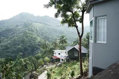 a view of the mountains from a house at Casa Lucio Resorts in Mannārakkāt