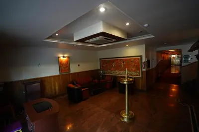 an overhead view of a living room with a couch at GD International Redfort in Nilambūr