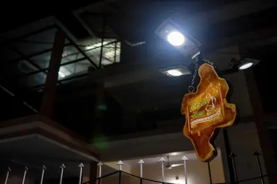 a sign hanging from the ceiling of a building at Belljem Homes -your own private resort -1 BR in Trichūr