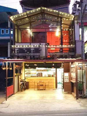 a building with a table on top of it at Leo's Residency Coorg in Kushālnagar