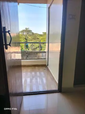 a sliding glass door with a view of a balcony at HOTEL ROYAL PARADISE in Coimbatore