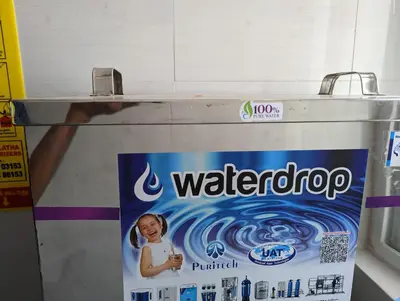 a package of waterdrop on a shelf in a store at Lakshmi Paradise Lodge A/C in Pollāchi