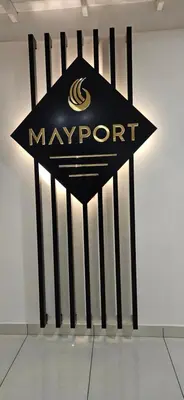a mayport sign on a wall in a room at MAYPORT HERITREAT in Alwaye