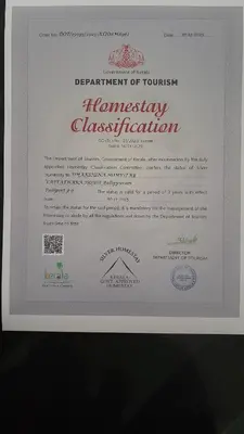 a white piece of paper with writing on it at Dhakshina Homestay in Cochin