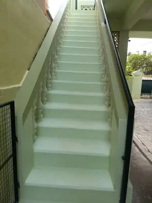 a stairway leading up to a building at Aishwarya Nivas in Palani