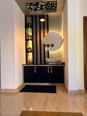 a bathroom with a sink and a mirror at Casa Maria Mystica apartments, Mananthavady, Wayanad in Mānantoddy