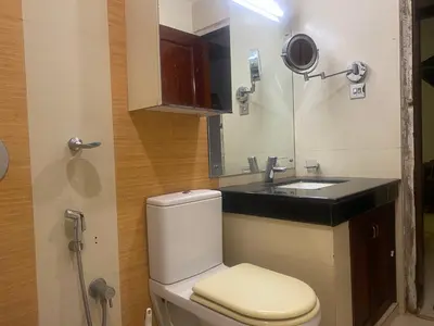 a bathroom with a toilet and a sink at 