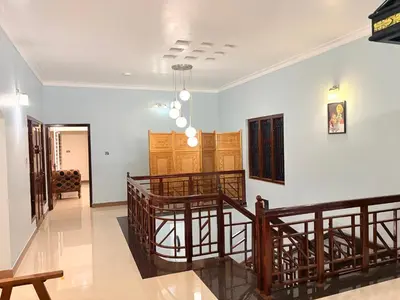 a hallway with a staircase in a house at 