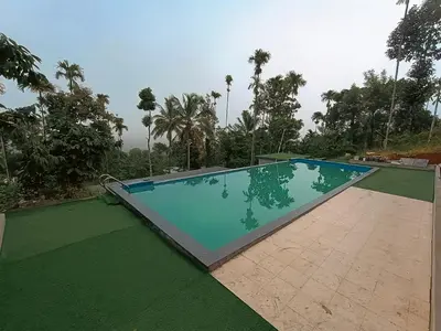 an empty swimming pool in a resort at kaffee valley - Kurumbalakotta in Padinjarathara