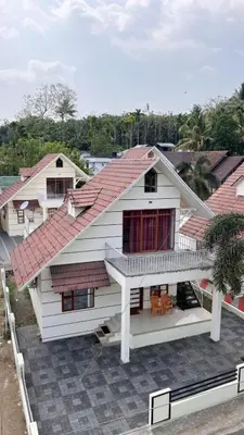 an aerial view of a house with a roof at SkYVIEW VILLA in Athirappilly